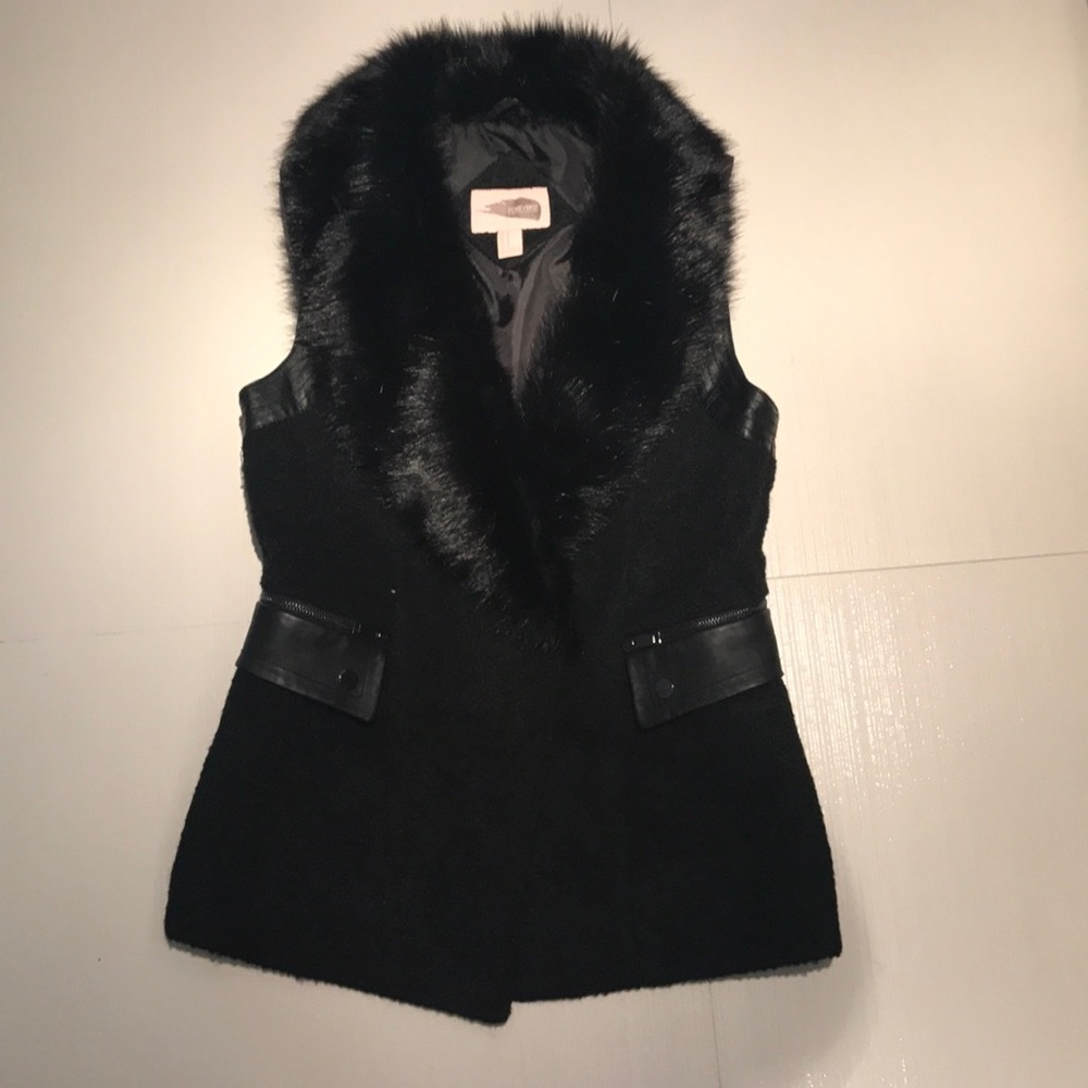 Black best with faux fur collar and leather